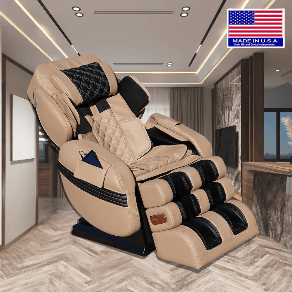 A beige and black massage chair with a matching foot massager, shown in a modern home office or lounge setting. The chair features quilted leather-like upholstery, padded headrest and neck support, and segmented massage rollers on the legs.