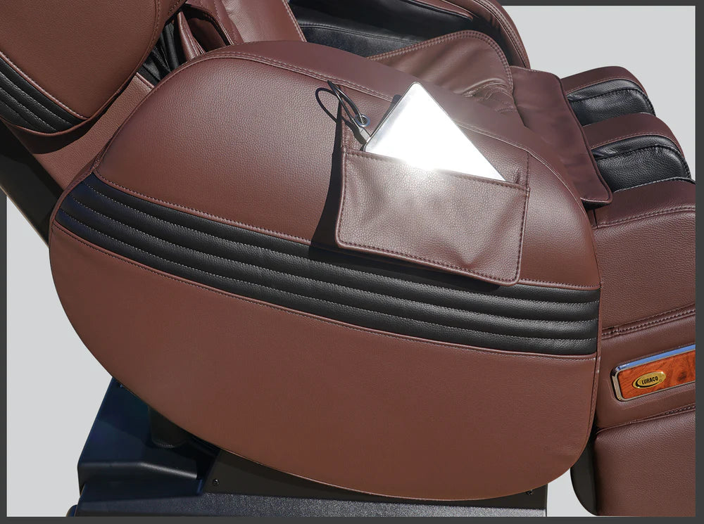 Brown massage chair with black accents on a gray background